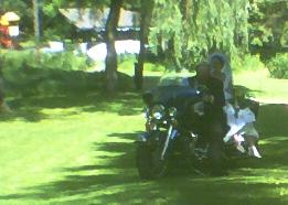 Only in Wisconsin does the Bride arrive on a Harley Davidson...