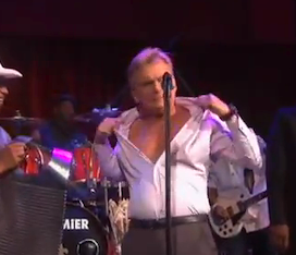 Pat Sajak rips open his shirt